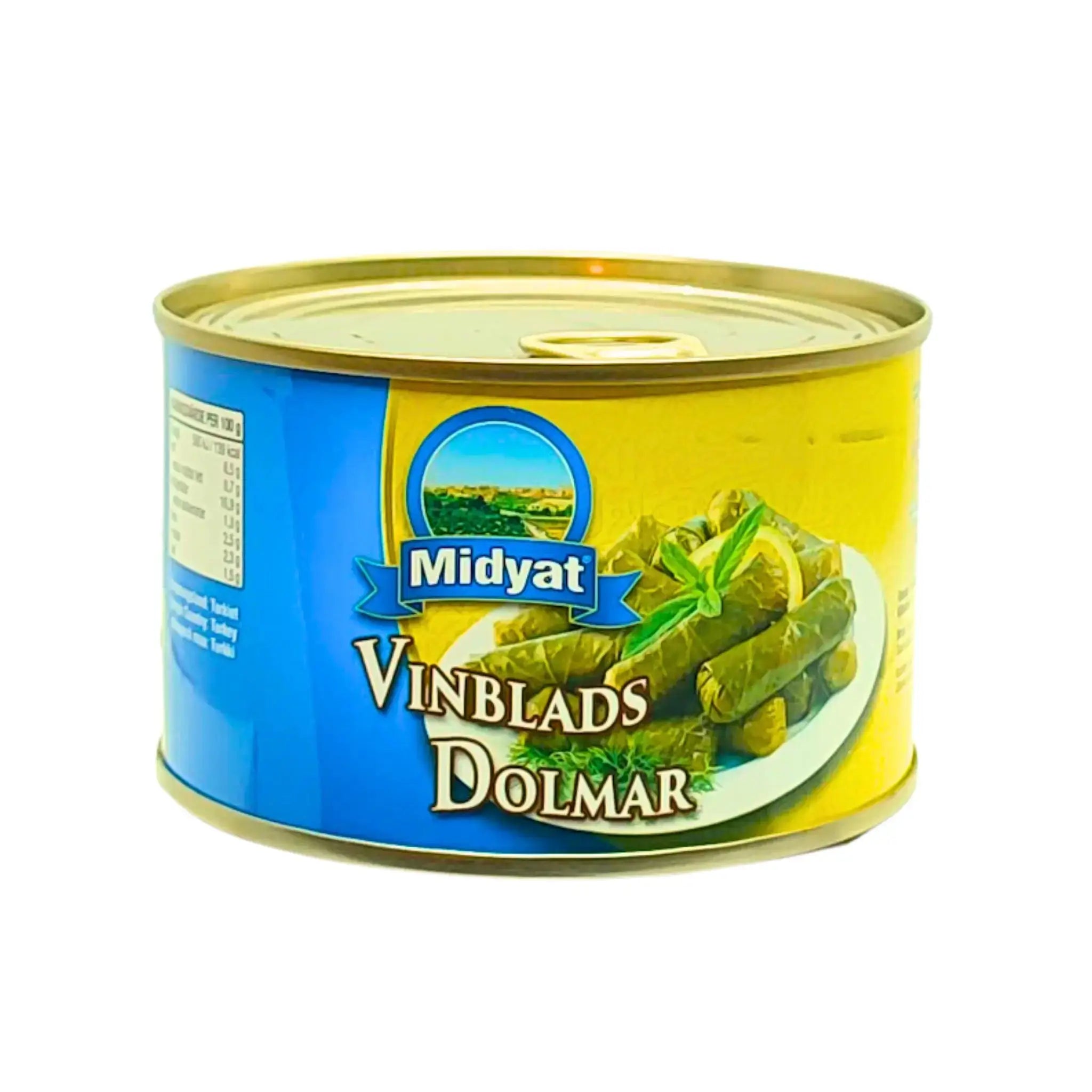 Konservburk med vinbladsdolmar Midyat, orientaliska fyllda vinblad på tallrik.